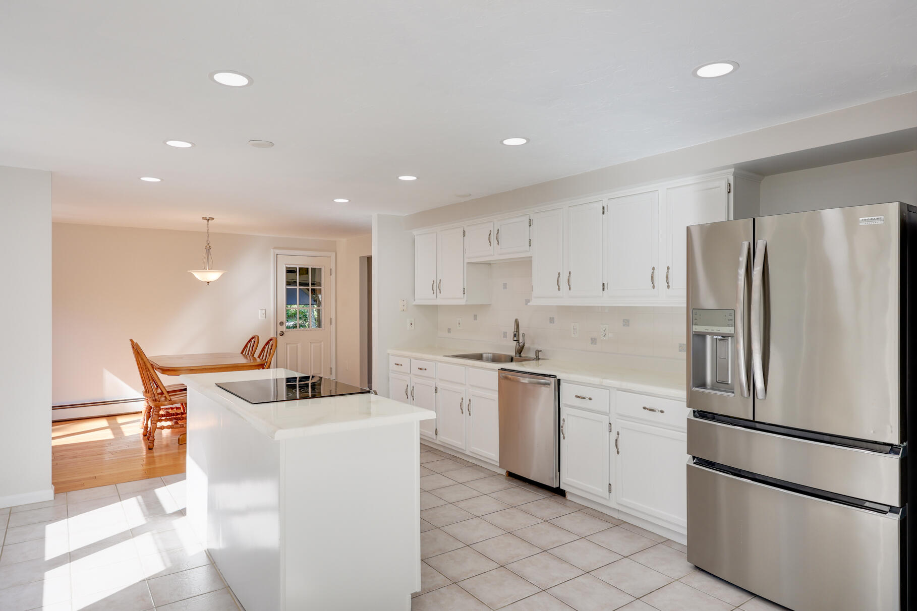7 Yearling Run Road Buzzards Bay, MA 02532 - Photo 17 of 55 a kitchen with stainless steel appliances a refrigerator sink and microwave