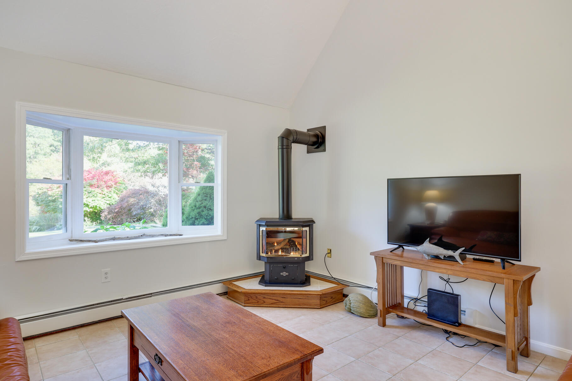 7 Yearling Run Road Buzzards Bay, MA 02532 - Photo 19 of 55 a living room with furniture and a flat screen tv