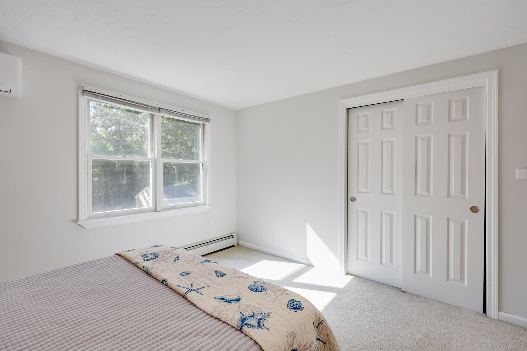 7 Yearling Run Road Buzzards Bay, MA 02532 - Photo 26 of 55 a view of a bedroom with wooden floor and a window