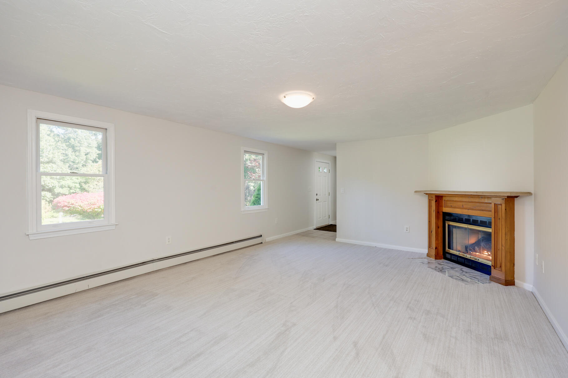 7 Yearling Run Road Buzzards Bay, MA 02532 - Photo 8 of 55 an empty room with windows