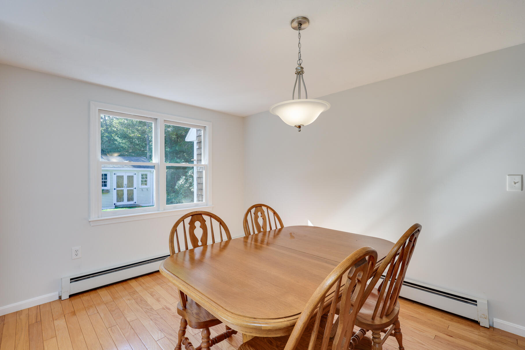 7 Yearling Run Road Buzzards Bay, MA 02532 - Photo 10 of 55 a view of a dining room with furniture window and wooden floor