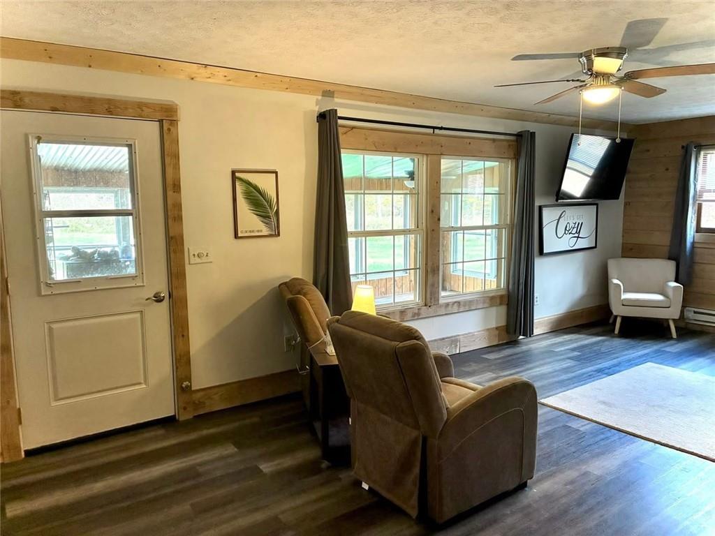 123 Hemlock Lane Utica, PA 16362 - Photo 11 of 30 a living room with furniture and a window
