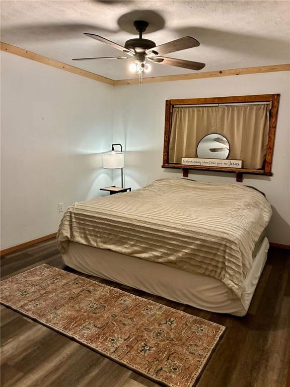 123 Hemlock Lane Utica, PA 16362 - Photo 20 of 30 a bedroom with a bed and a chandelier