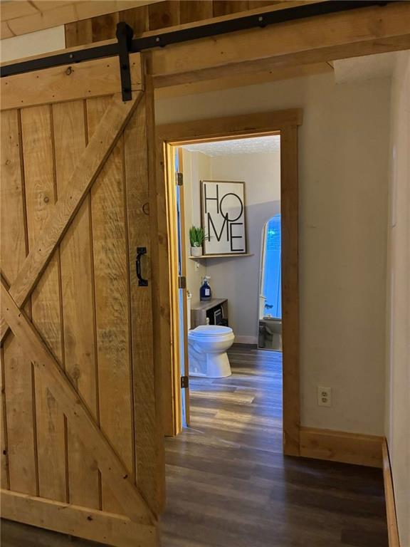 123 Hemlock Lane Utica, PA 16362 - Photo 21 of 30 a view of a hallway with wooden floor and stairs