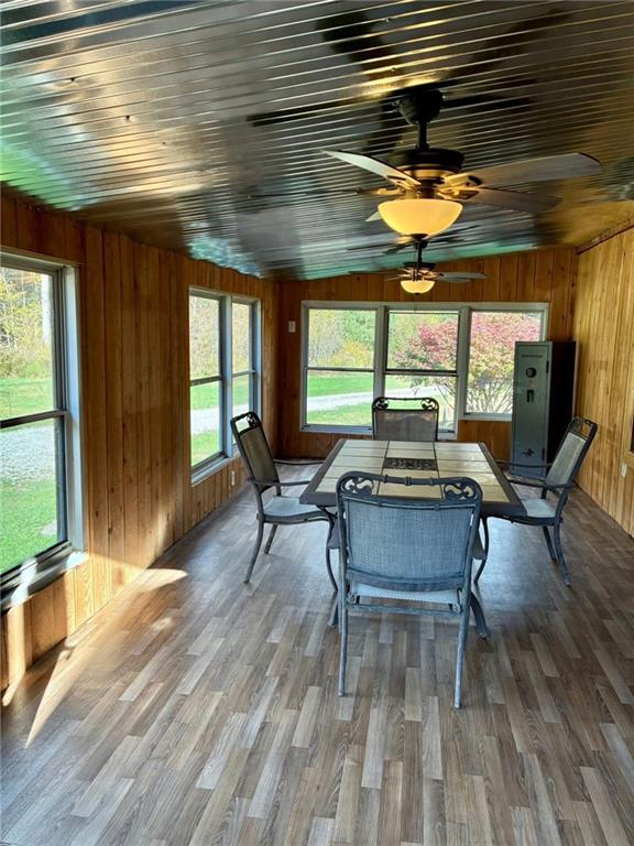 123 Hemlock Lane Utica, PA 16362 - Photo 23 of 30 a dining room with furniture and wooden floor