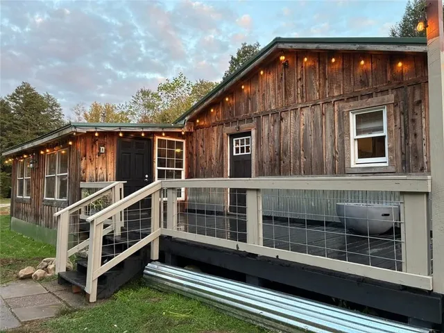 a view of a house with roof deck