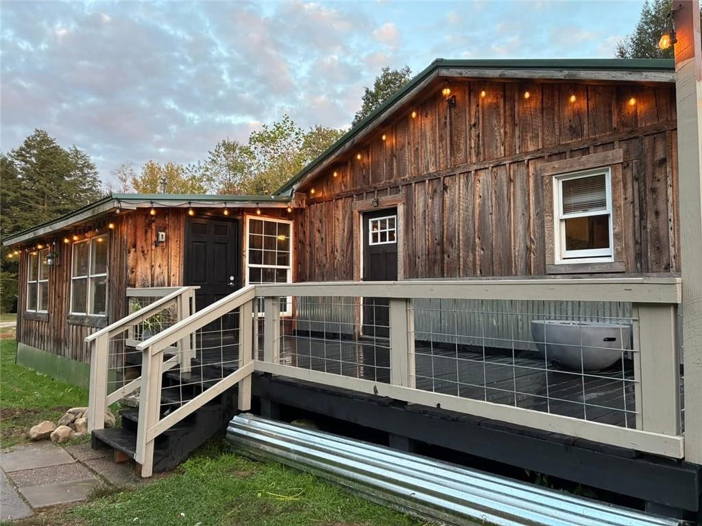 123 Hemlock Lane Utica, PA 16362 - Photo 4 of 30 a view of a house with roof deck