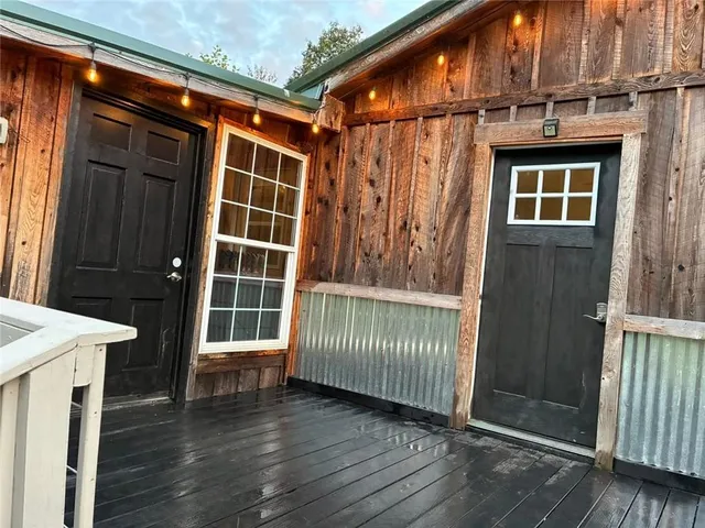 a view of a house with a wooden floor