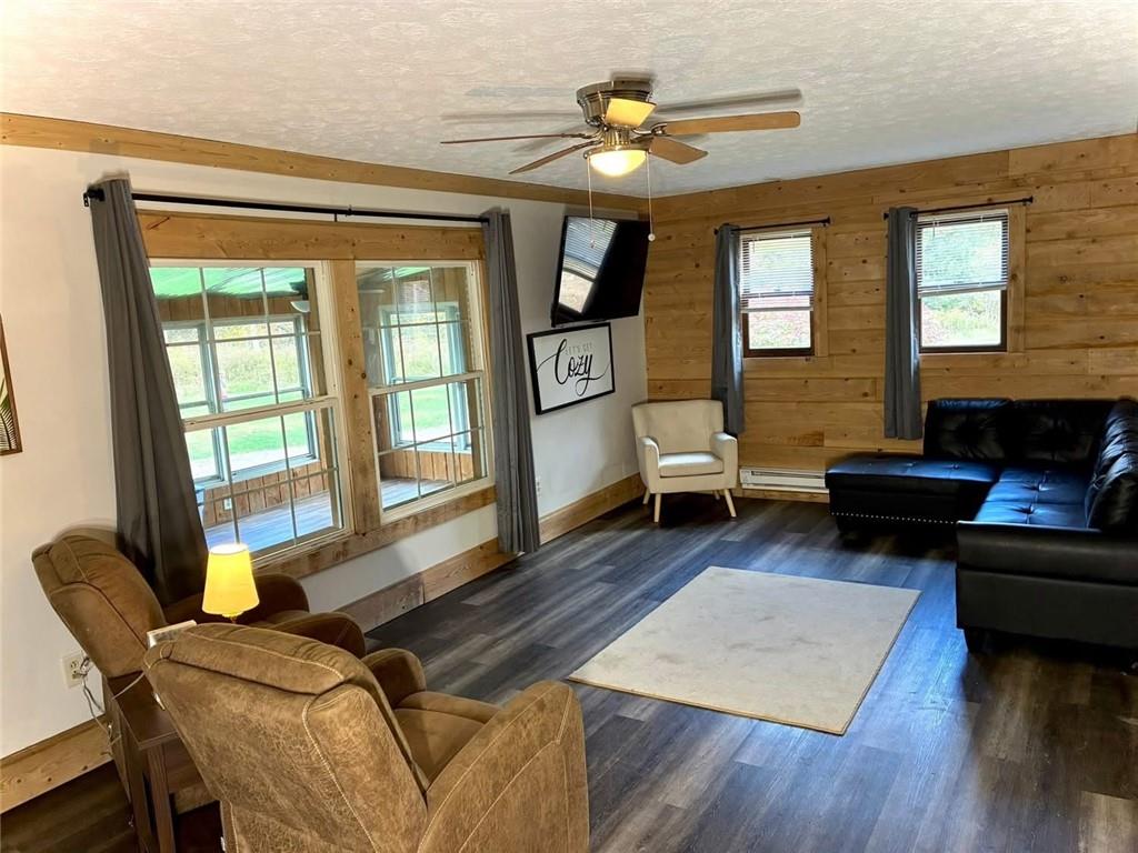 123 Hemlock Lane Utica, PA 16362 - Photo 9 of 30 a living room with furniture and wooden floor