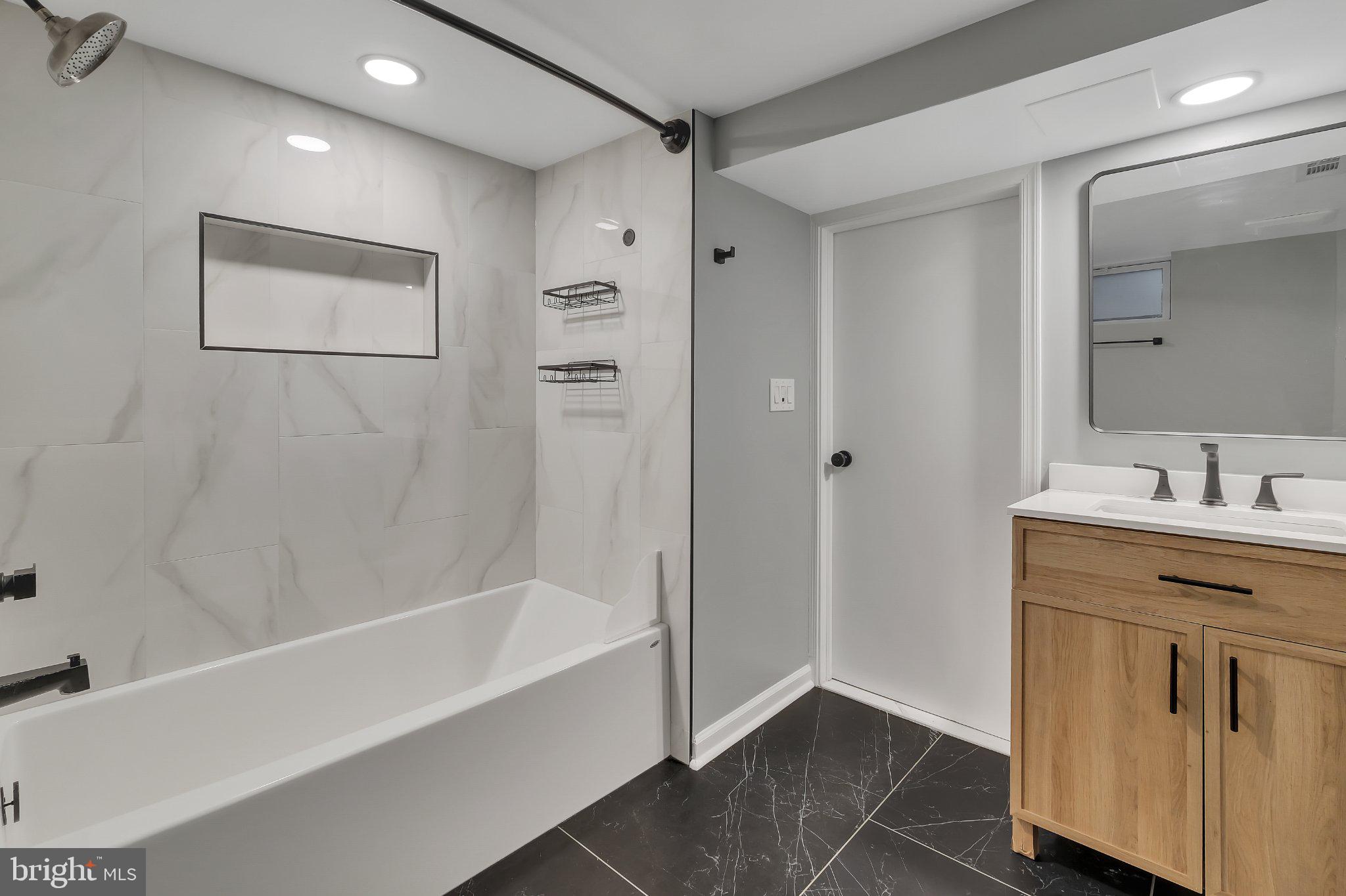 1706 North Glebe Road Arlington, VA 22207 - Photo 29 of 36 Sleek modern bathroom retreat.
