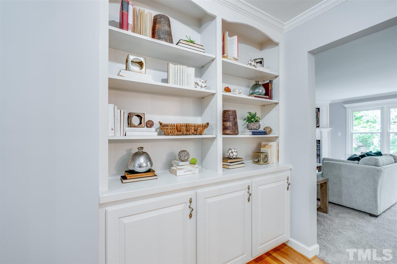 12608 Old Creedmoor Road Raleigh, NC 27613 - Photo 12 of 30 a view of cabinets and wooden floor