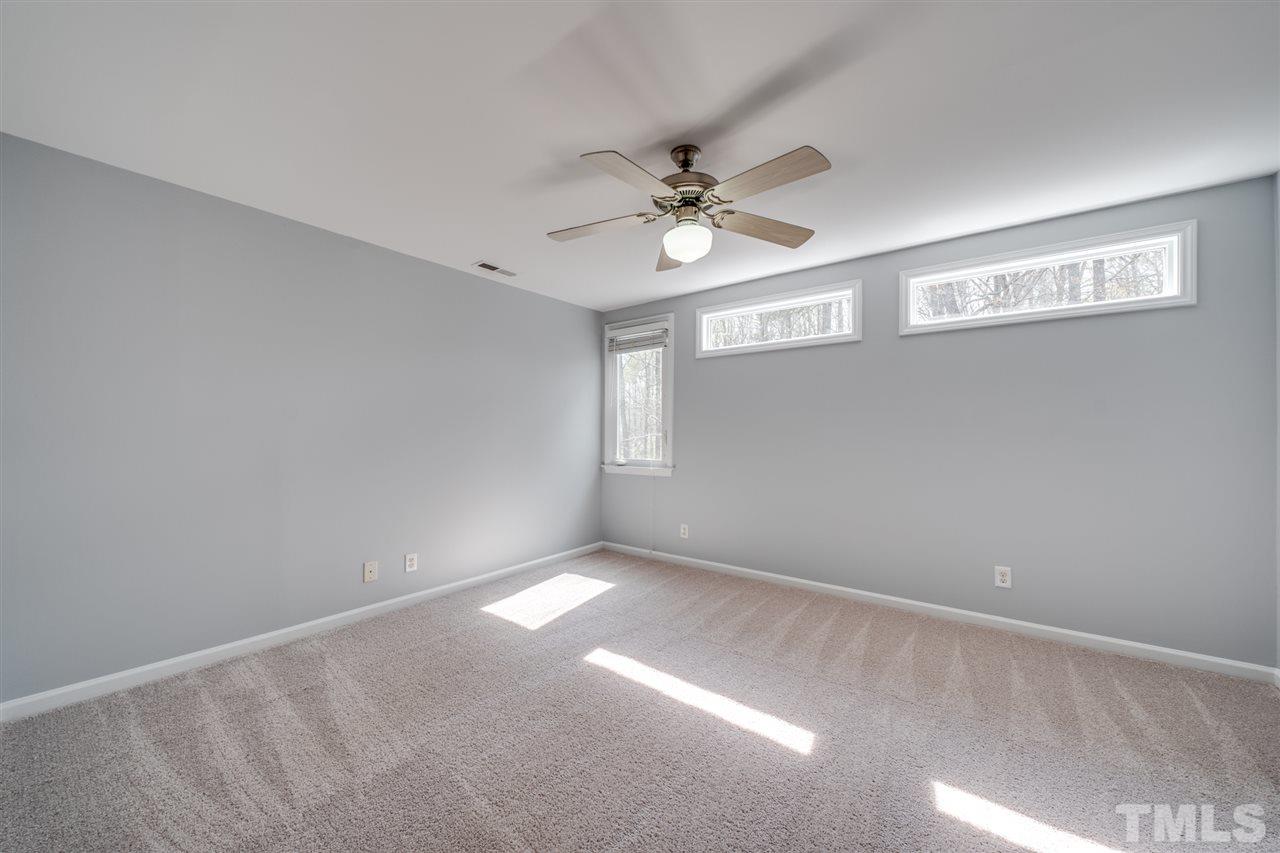 12608 Old Creedmoor Road Raleigh, NC 27613 - Photo 21 of 30 a view of an empty room