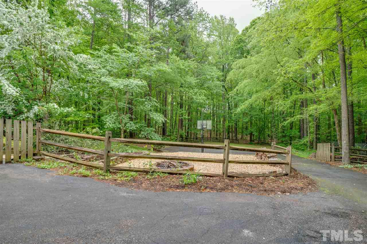 12608 Old Creedmoor Road Raleigh, NC 27613 - Photo 27 of 30 a view of a park with large trees