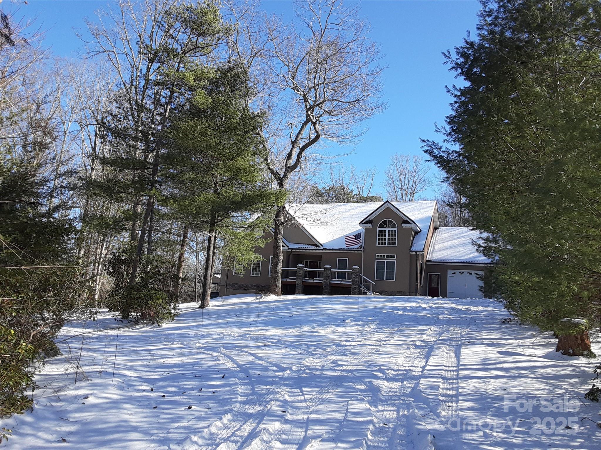 31 Reeds Creek Road Fairview, NC 28730 - Photo 33 of 35 a view of a house with a yard