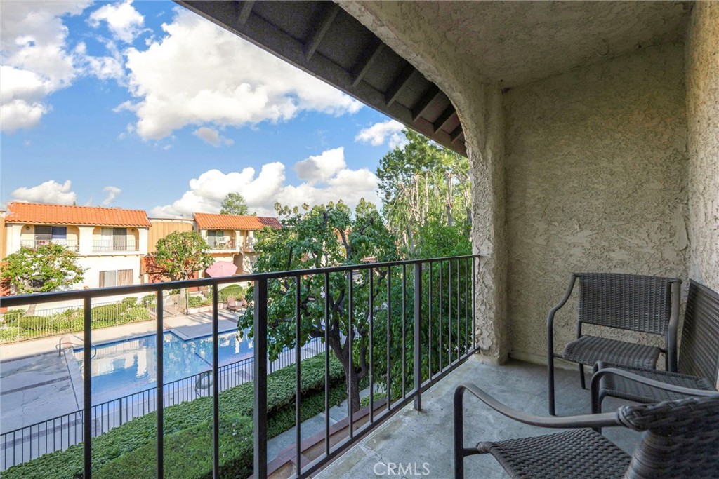 19545 Sherman Way, Unit 97 Reseda, CA 91335 - Photo 12 of 26 a view of a balcony with furniture