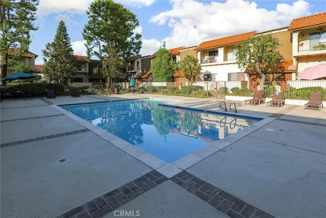 a view of a street with cars