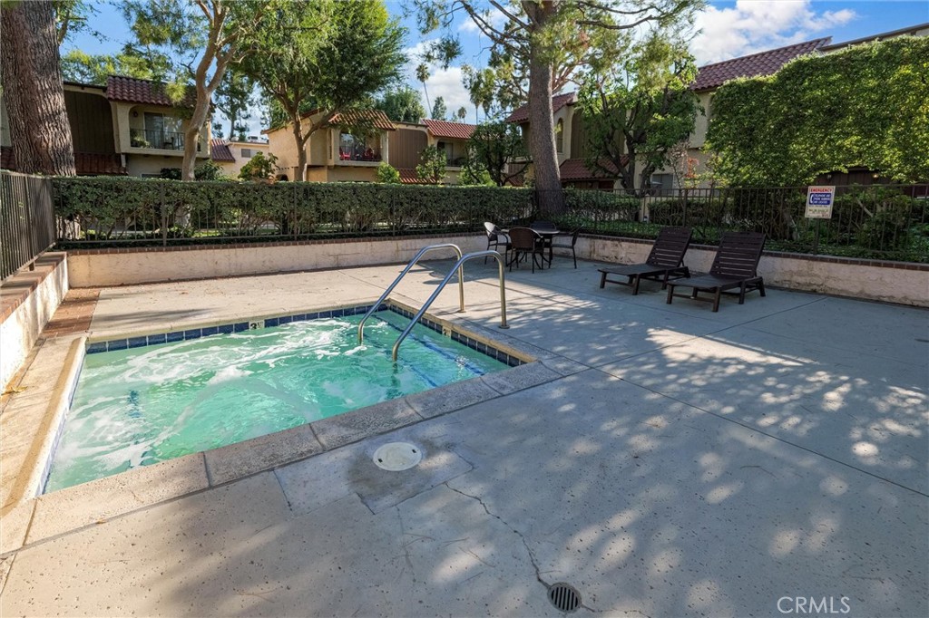 19545 Sherman Way, Unit 97 Reseda, CA 91335 - Photo 20 of 26 a view of backyard with sitting area