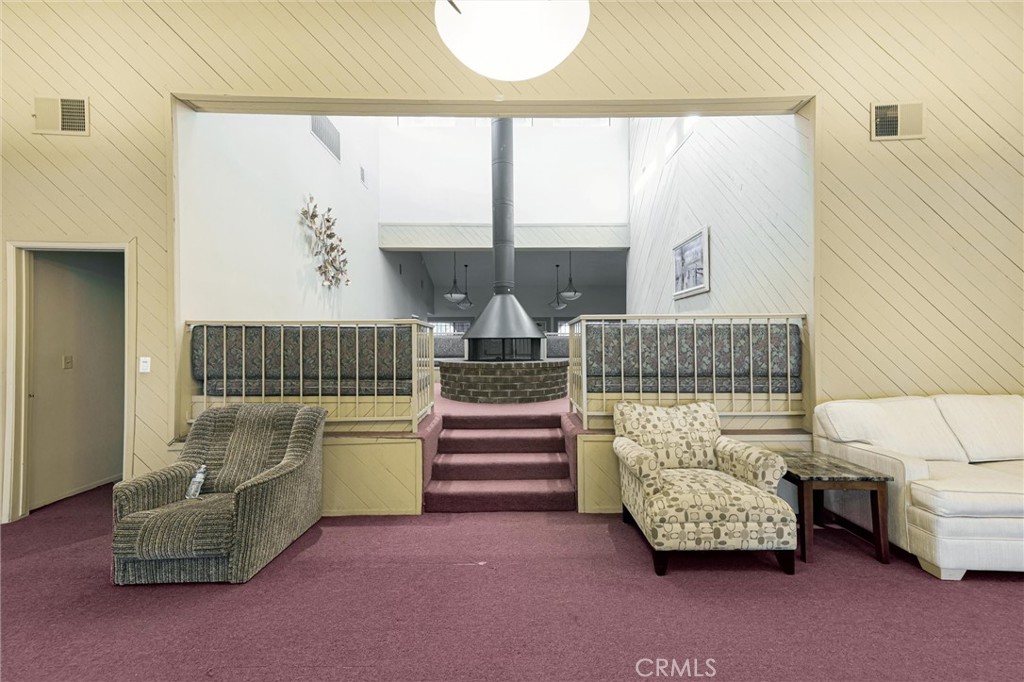 19545 Sherman Way, Unit 97 Reseda, CA 91335 - Photo 23 of 26 a bedroom with furniture and a window