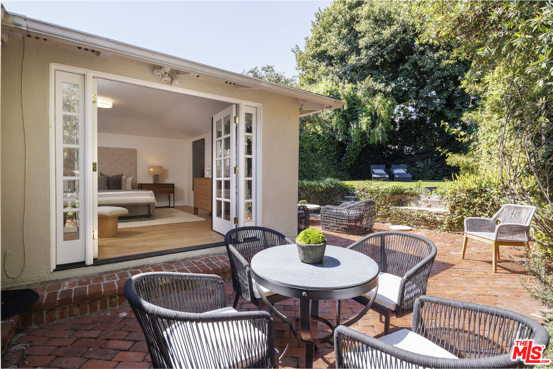 10613 Rochester Avenue Los Angeles, CA 90024 - Photo 24 of 27 a outdoor dining space with furniture and outdoor view