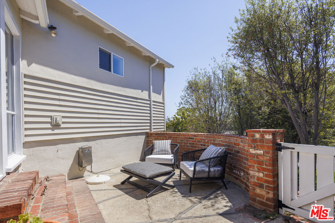 10613 Rochester Avenue Los Angeles, CA 90024 - Photo 8 of 27 a view of a patio with couple of chairs