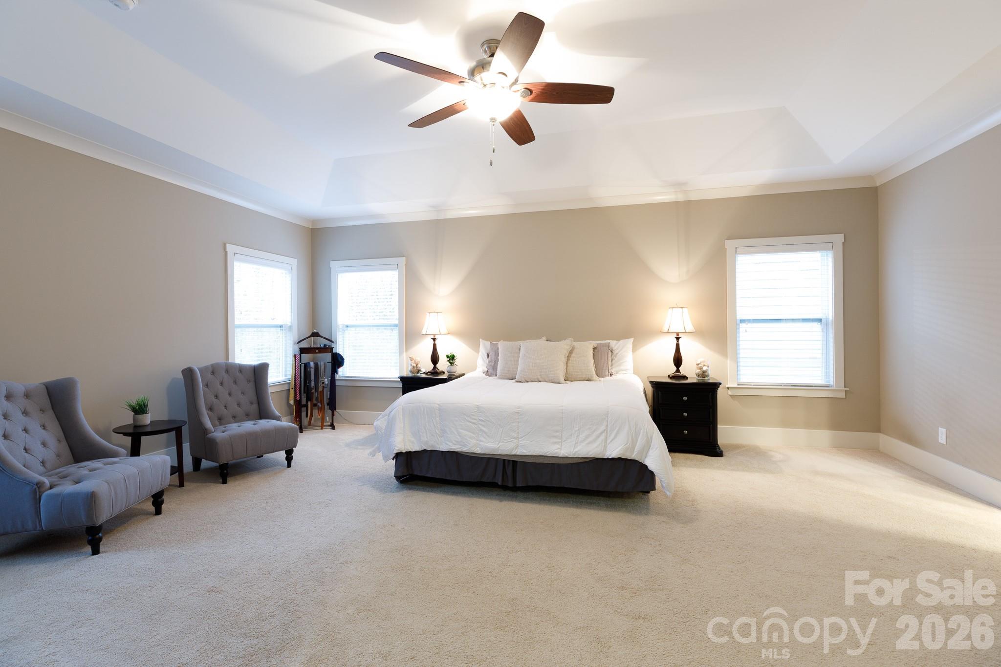 2172 Bluebell Way Tega Cay, SC 29708 - Photo 20 of 40 a bedroom with bed and window