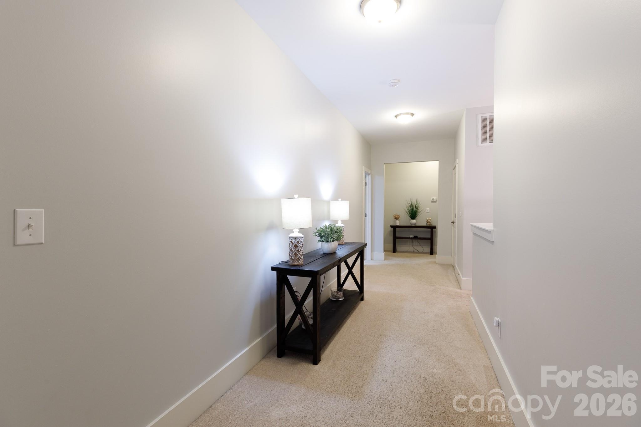 2172 Bluebell Way Tega Cay, SC 29708 - Photo 25 of 40 a view of a living room and bathroom