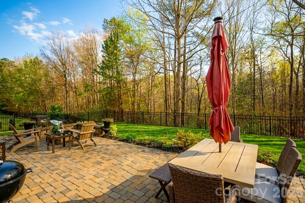 2172 Bluebell Way Tega Cay, SC 29708 - Photo 37 of 40 a view of a tables and chairs on the roof deck
