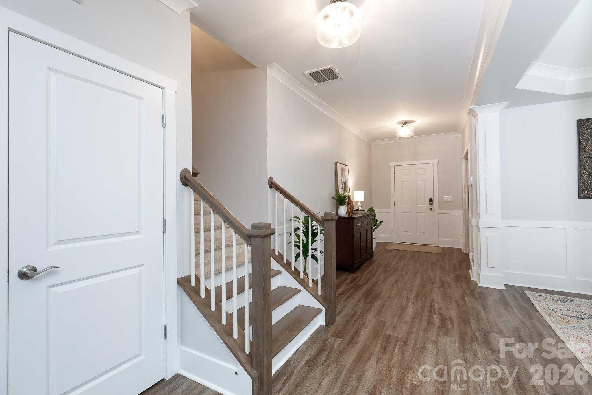 2172 Bluebell Way Tega Cay, SC 29708 - Photo 5 of 40 a view of entryway with wooden floor