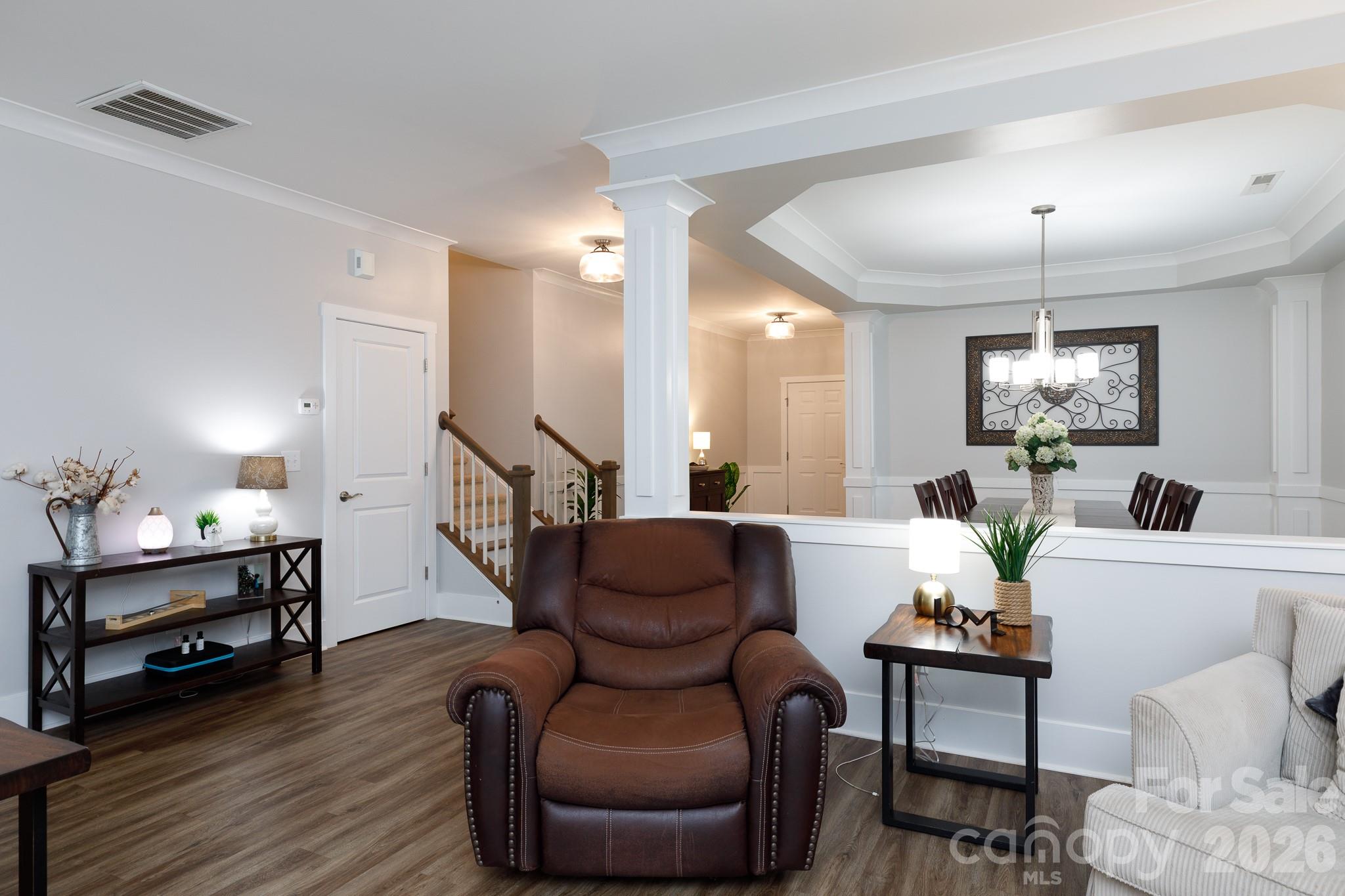2172 Bluebell Way Tega Cay, SC 29708 - Photo 8 of 40 a living room with furniture and wooden floor