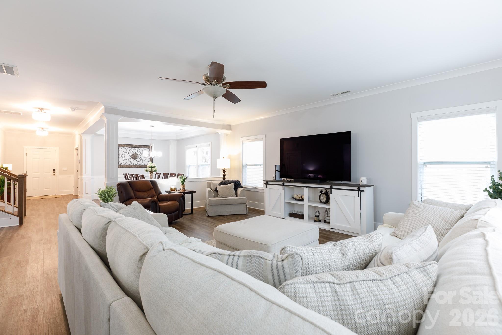 2172 Bluebell Way Tega Cay, SC 29708 - Photo 9 of 40 a living room with furniture and a flat screen tv