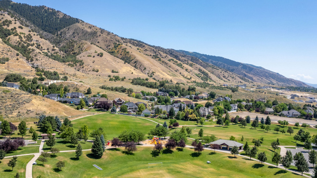 1473 Red Fox Court, Unit 4 Logan, UT 84321 - Photo 18 of 19 Residential community nestled against a mountainous backdrop