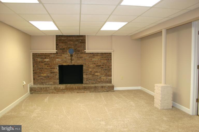 13163 Kaiser Ridge Road Hagerstown, MD 21740 - Photo 8 of 29 a view of empty room with fireplace