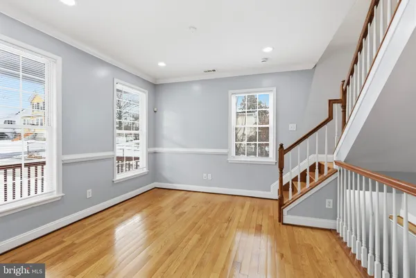 a view of entryway with wooden floor