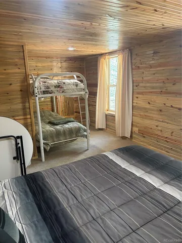 a view of an empty room and a window