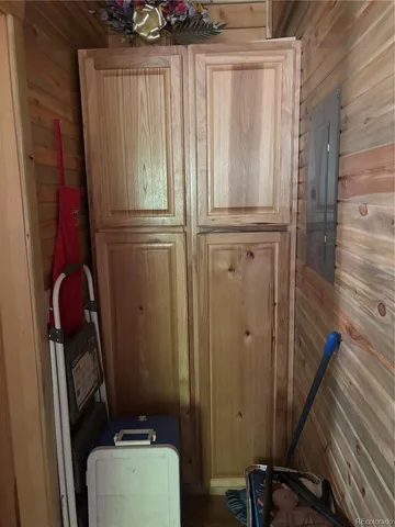 a backyard of a house with barbeque oven