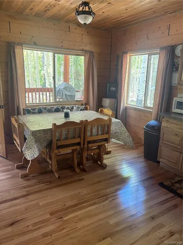 a bedroom with furniture and a fireplace