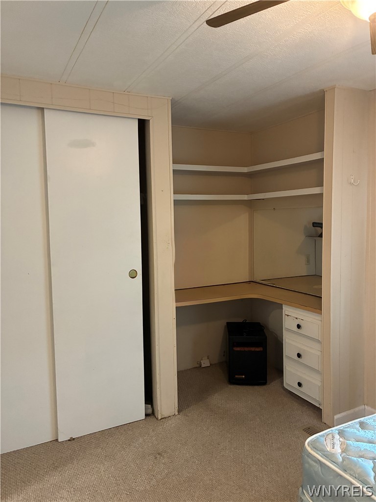 6035-286 South Transit Road, Unit 286 Lockport, NY 14094 - Photo 26 of 48 2ND FULL BEDROOM/DOUBLE SLIDERS DOOR