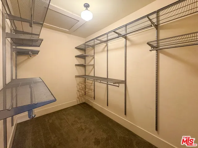 a view of a room with rack on the wall