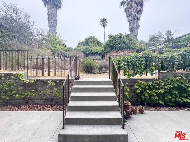 a view of hallway with an empty room