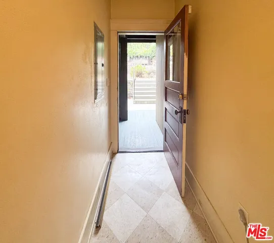 a view of balcony with furniture