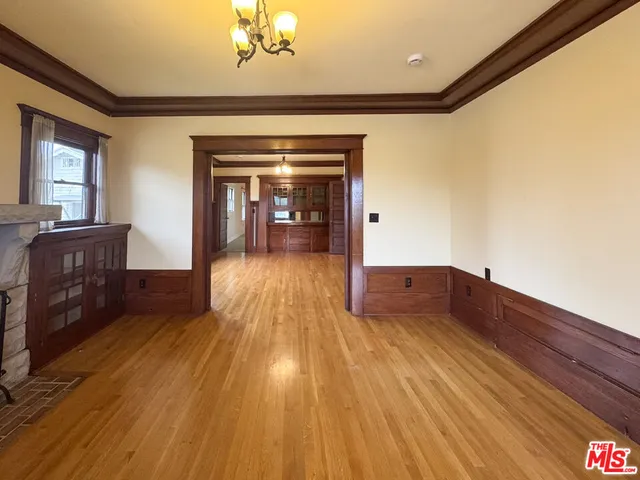 a view of a livingroom with wooden floor