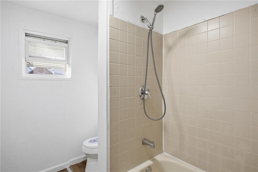 212 Comrie Avenue Braddock, PA 15104 - Photo 14 of 18 a bathroom with a shower