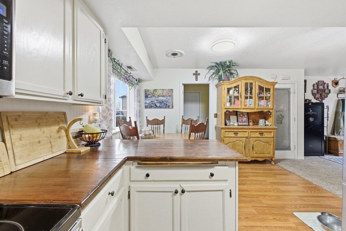 650 Sarah Lane Eagle Point, OR 97524 - Photo 11 of 19 a kitchen with stainless steel appliances granite countertop a sink and cabinets
