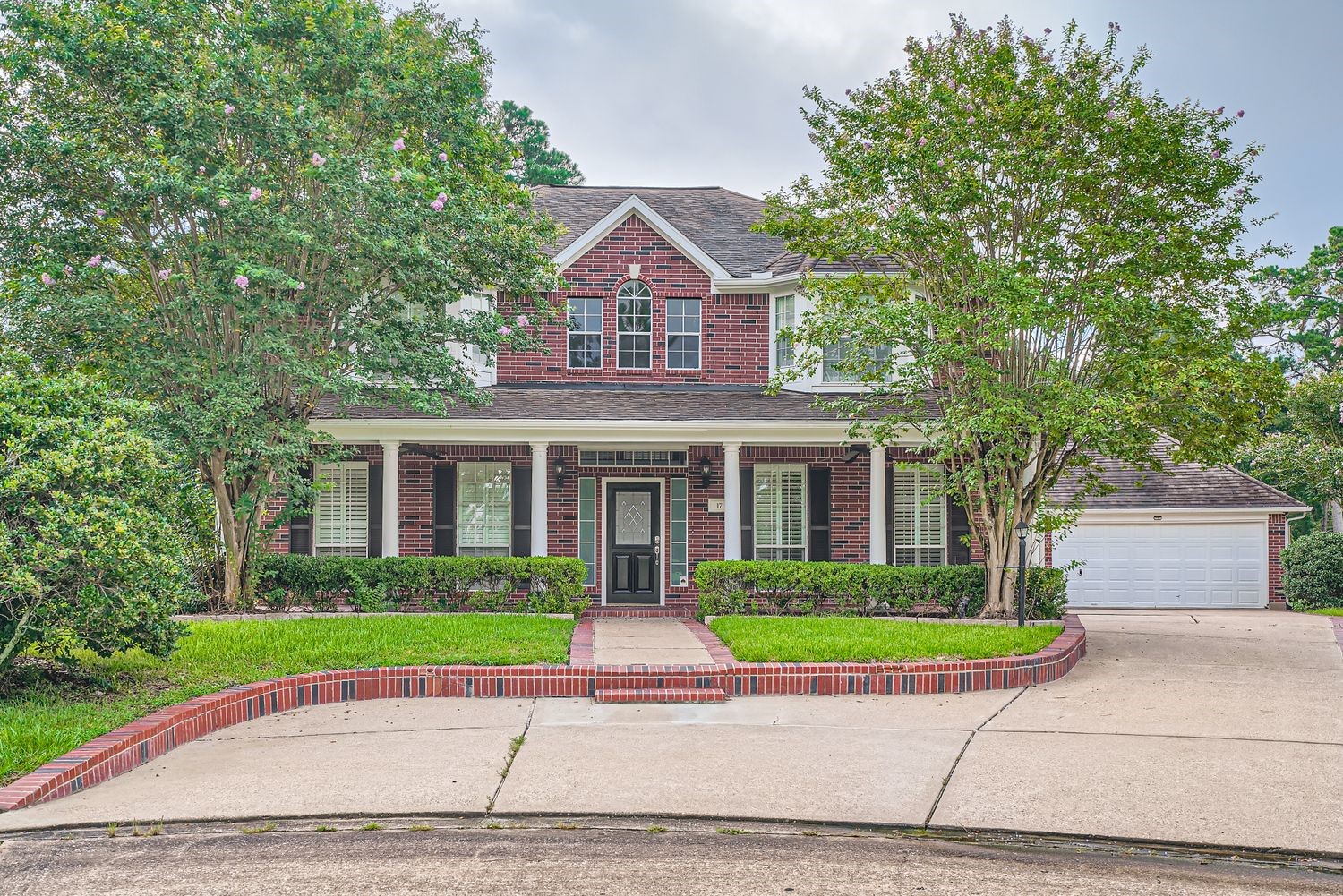 17 Leandro Court Montgomery, TX 77356 - Photo 1 of 38 a front view of a house with a garden