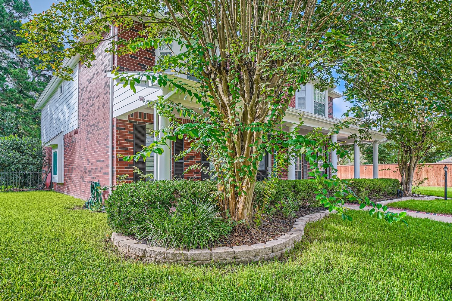 17 Leandro Court Montgomery, TX 77356 - Photo 2 of 38 a front view of a house with a yard