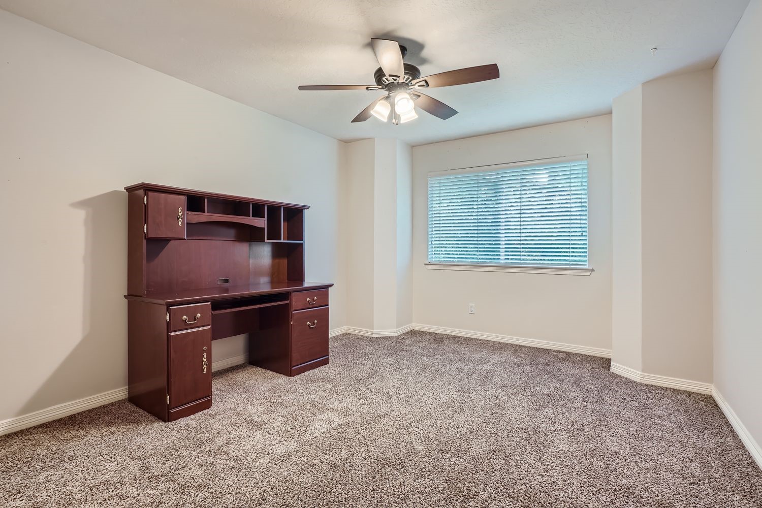 17 Leandro Court Montgomery, TX 77356 - Photo 25 of 38 a kitchen with stainless steel appliances granite countertop a stove and a refrigerator