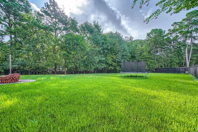 a view of a backyard with a garden