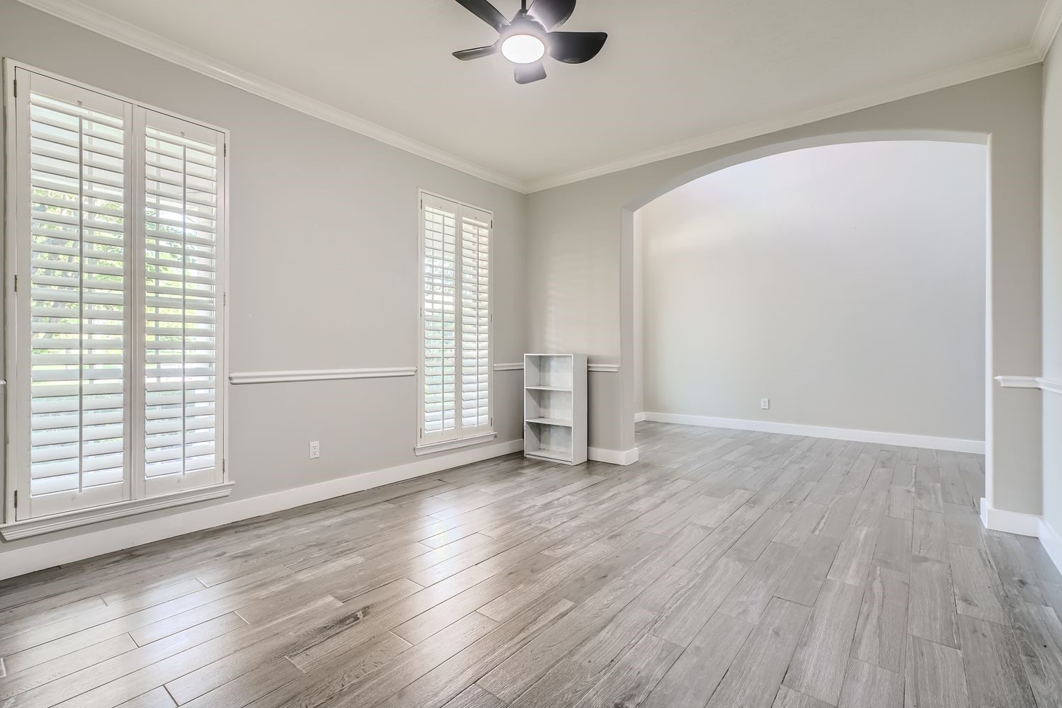 17 Leandro Court Montgomery, TX 77356 - Photo 9 of 38 wooden floor in an empty room with a window