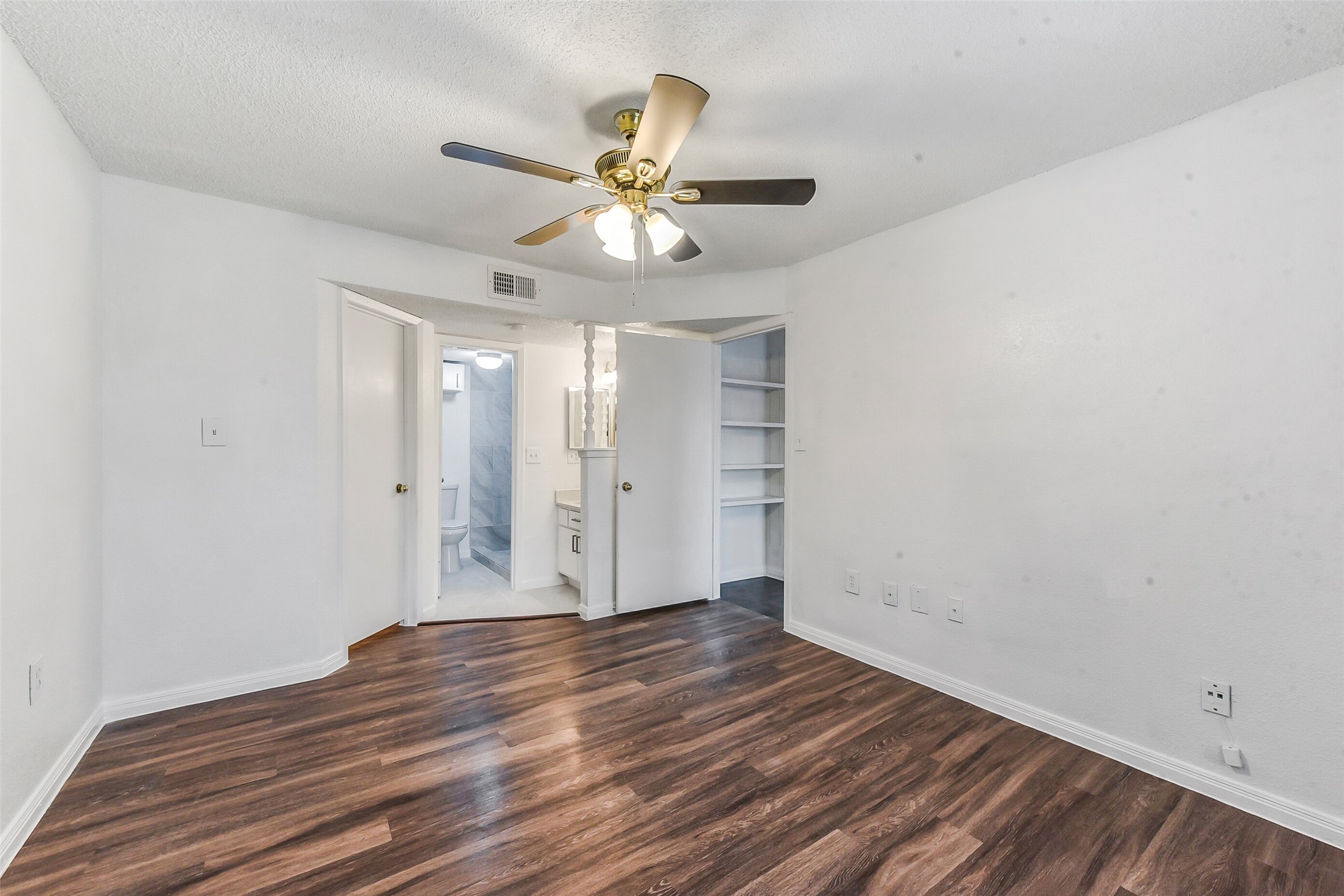 250 El Dorado Boulevard, Unit 248 Webster, TX 77598 - Photo 10 of 16 wooden floor in an empty room