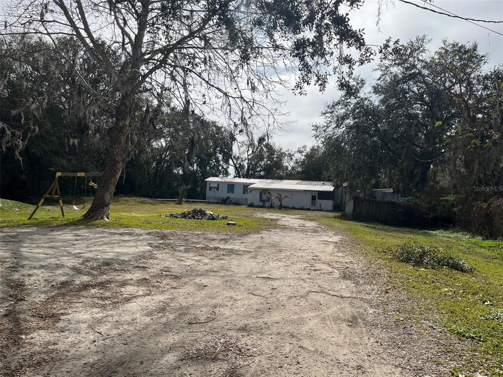3736 Valley Farm Road Lakeland, FL 33810 - Photo 2 of 2 a view of a yard with a slide